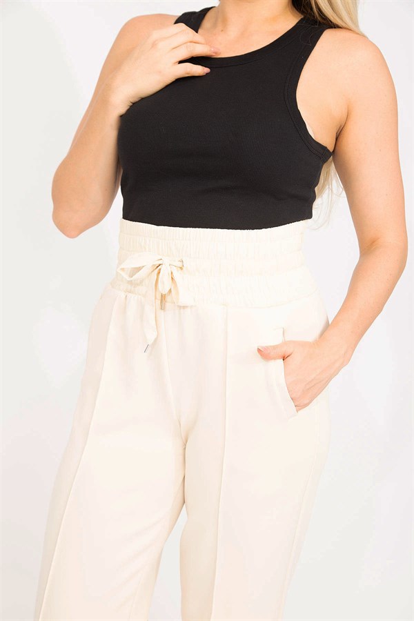 Kadın Bej Likralı Scuba Kumaş Beli Geniş Lastik Ve Ütü İzi Dikiş Detaylı Pantolon 65N35275