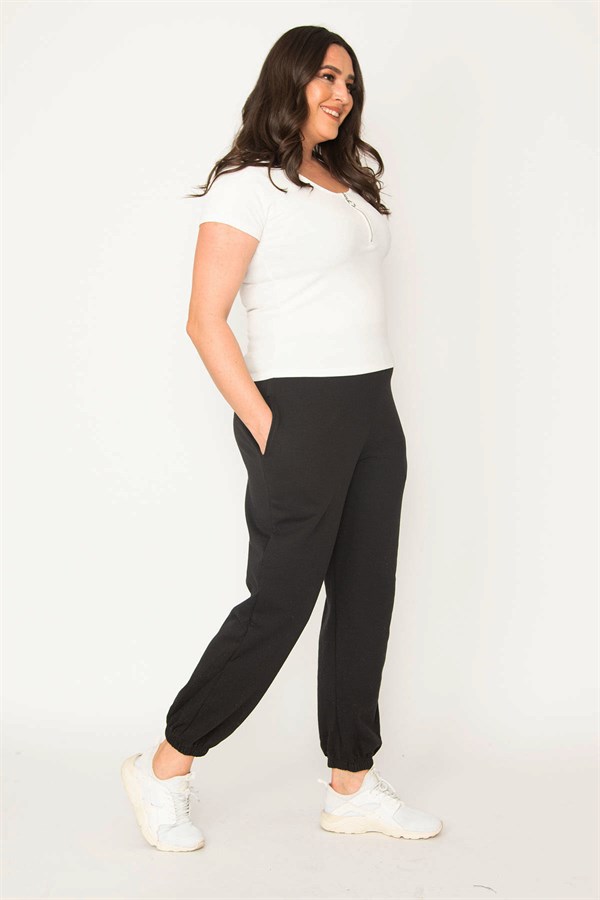 Kadın Gri Pamuklu Kumaş İçi Şardon Paça Ve Bel Lastikli Cep Detaylı Eşofman Alt  65N30436