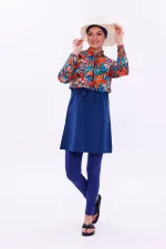 Maillot de bain une pièce imperméable de type parachute, avec leggings et double bonnet.