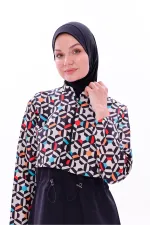 Maillot de bain une pièce imperméable de type parachute, avec leggings et double bonnet.