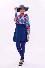 Maillot de bain une pièce imperméable de type parachute, avec leggings et double bonnet.