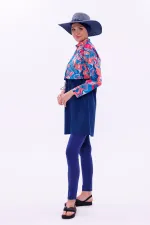 Maillot de bain une pièce imperméable de type parachute, avec leggings et double bonnet.