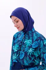 Maillot de bain une pièce imperméable de type parachute, avec leggings et double bonnet.