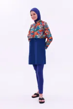 Maillot de bain une pièce imperméable de type parachute, avec leggings et double bonnet.