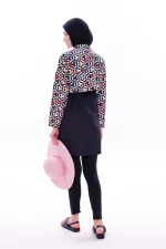 Maillot de bain une pièce imperméable de type parachute, avec leggings et double bonnet.