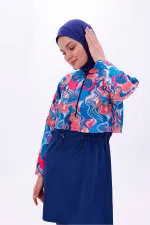 Maillot de bain une pièce imperméable de type parachute, avec leggings et double bonnet.