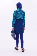 Maillot de bain une pièce imperméable de type parachute, avec leggings et double bonnet.