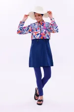 Maillot de bain une pièce imperméable de type parachute, avec leggings et double bonnet.