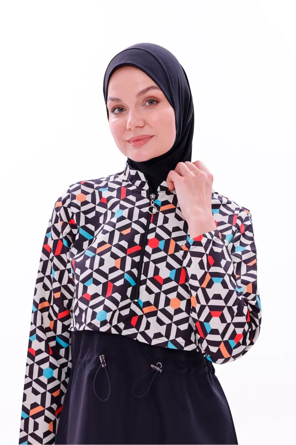 Maillot de bain une pièce imperméable de type parachute, avec leggings et double bonnet.