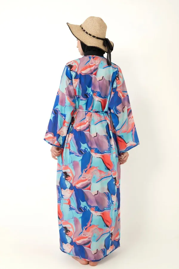 Paréo à motifs à porter par-dessus un maillot de bain couvrant.