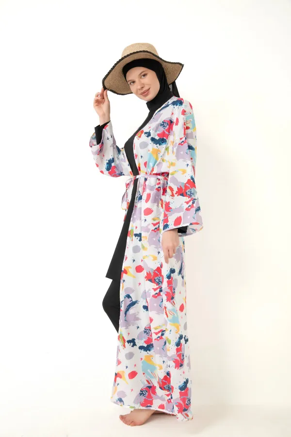 Paréo à motifs à porter par-dessus un maillot de bain couvrant.