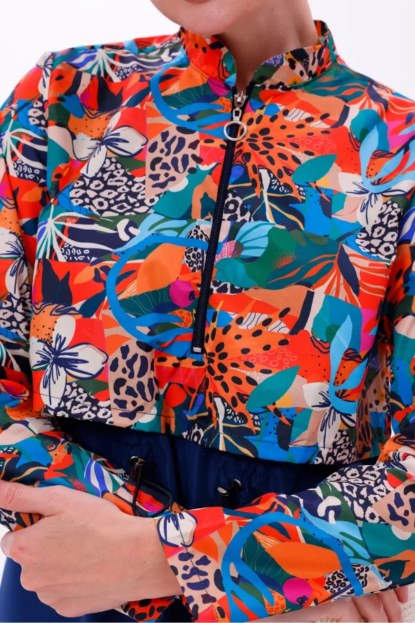 Maillot de bain une pièce imperméable de type parachute, avec leggings et double bonnet.