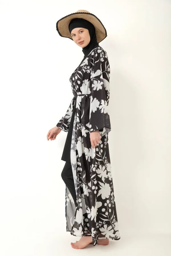 Paréo à motifs à porter par-dessus un maillot de bain couvrant.