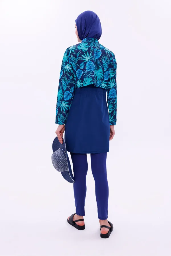 Maillot de bain une pièce imperméable de type parachute, avec leggings et double bonnet.