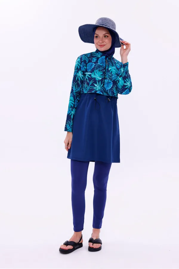 Maillot de bain une pièce imperméable de type parachute, avec leggings et double bonnet.