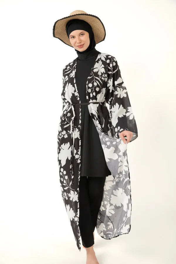 Paréo à motifs à porter par-dessus un maillot de bain couvrant.