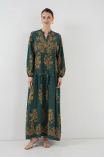 Robe hijab vert émeraude à motifs dorés 2423