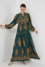 Robe hijab vert émeraude à motifs dorés 2423