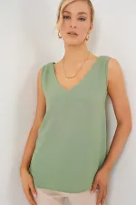 V Yaka Sıfır Kol Bluz 950 - Çağla