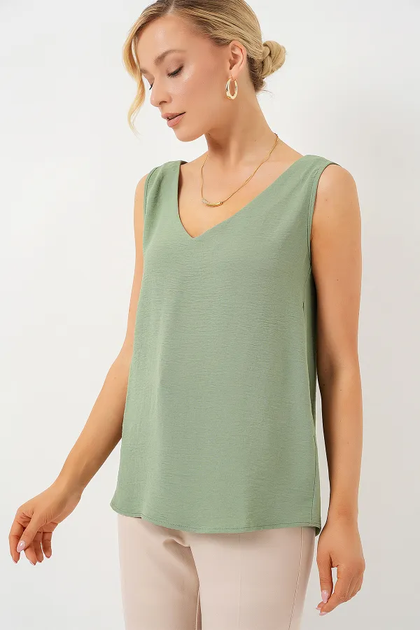 V Yaka Sıfır Kol Bluz 950 - Çağla