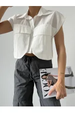 Chemise blanche à poches