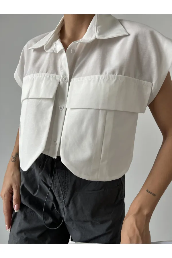 Chemise blanche à poches