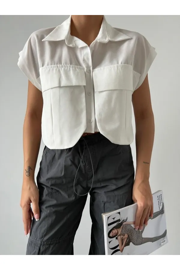 Chemise blanche à poches