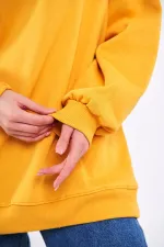 Sweat-shirt basique oversize en coton jaune pour femme, col rond.