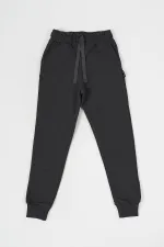 Ensemble de 2 pantalons de survêtement pour filles en coton épais noir et anthracite, avec taille et chevilles élastiques et poches.