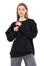 Sweat-shirt basique oversize en coton noir pour femme, col rond.