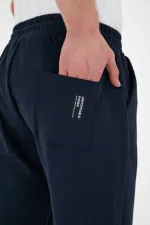 Pantalon de survêtement bleu marine pour homme, avec étiquette, poches arrière et latérales, coupe classique, taille élastiquée
