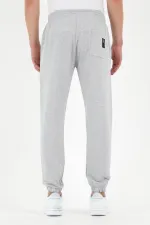 Pantalon de survêtement gris pour homme avec étiquette, poches arrière et latérales, coupe classique, taille élastique