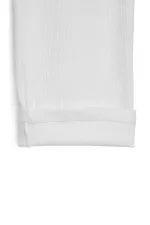 Pantalon de survêtement d'hiver écru à jambes larges et taille élastique pour enfants.