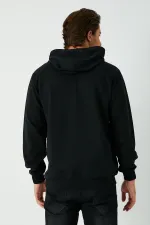 Sweat-shirt à capuche noir pour homme avec poche kangourou
