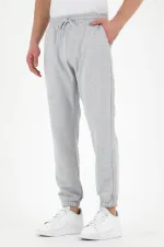 Pantalon de survêtement gris pour homme avec étiquette, poches arrière et latérales, coupe classique, taille élastique
