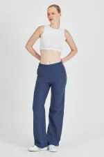 Pantalon de survêtement indigo côtelé à jambes larges et taille haute avec poches pour femme