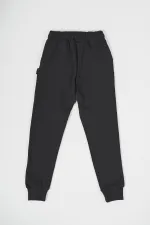 Lot de 3 pantalons de survêtement pour filles en coton épais, coloris noir, marine et anthracite, avec taille et chevilles élastiques et poches.