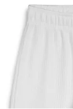 Pantalon de survêtement d'hiver écru à jambes larges et taille élastique pour enfants.