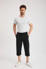 Short bermuda noir pour homme, longueur genou, style capri, avec poches latérales et taille élastique ajustable MTLCE108