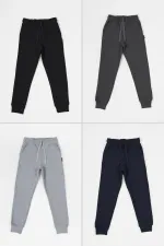 Lot de 4 bas de survêtement pour garçon en coton épais, taille élastique et poches sur les jambes, coloris noir, bleu marine, anthracite et gris.
