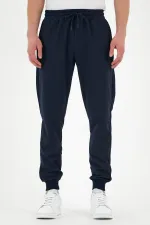 Pantalon de survêtement bleu marine pour homme, avec étiquette, poches arrière et latérales, coupe classique