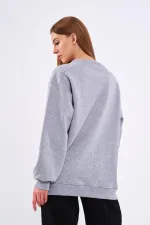 Sweat-shirt basique oversize en coton gris pour femme, col rond.