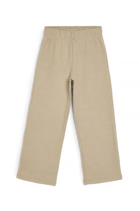 Pantalon de survêtement beige à jambes larges pour enfants, idéal pour l'hiver, avec taille élastique.