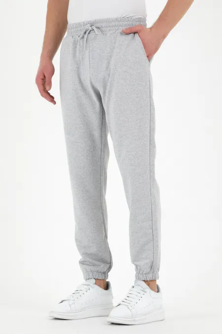 Pantalon de survêtement gris pour homme avec étiquette, poches arrière et latérales, coupe classique, taille élastique