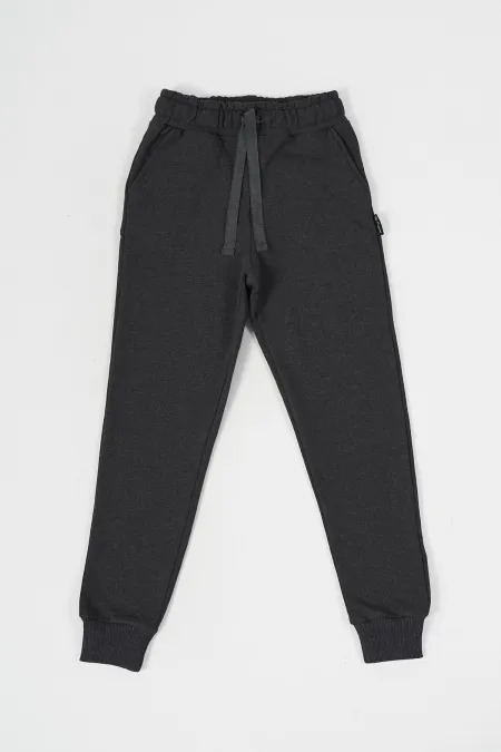 Pantalon de survêtement en coton épais anthracite avec taille et chevilles élastiques, pour filles de 5 à 12 ans.
