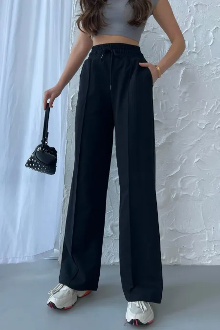 Pantalon de survêtement noir décontracté pour femme, jambes larges et taille haute, idéal pour la saison