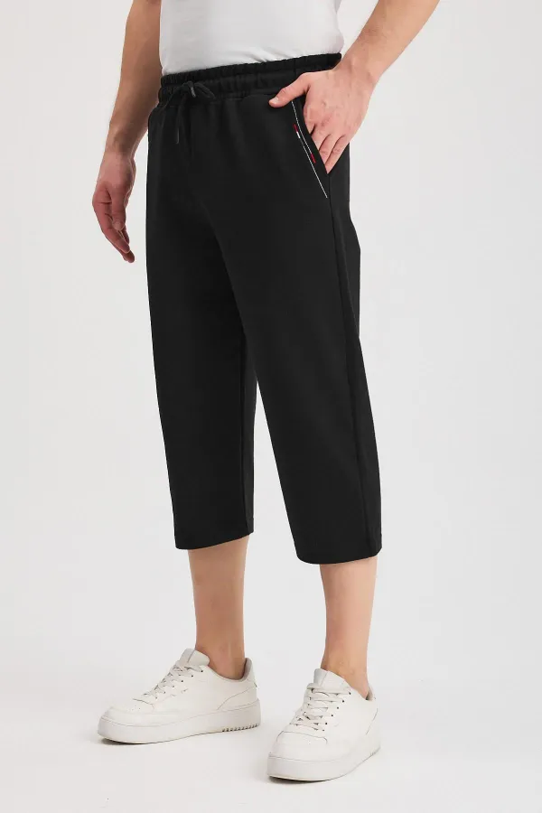 Short bermuda noir pour homme, longueur genou, style capri, avec poches latérales et taille élastique ajustable MTLCE108