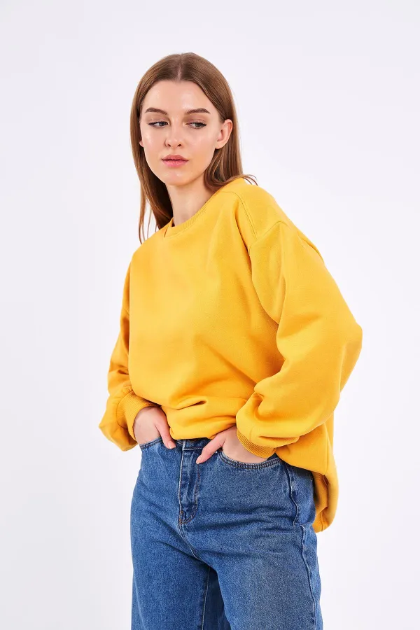 Sweat-shirt basique oversize en coton jaune pour femme, col rond.