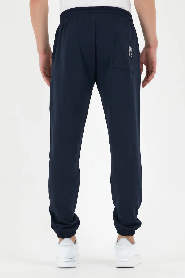 Pantalon de survêtement bleu marine pour homme, avec étiquette, poches arrière et latérales, coupe classique, taille élastiquée
