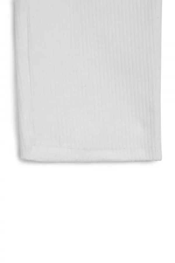 Pantalon de survêtement d'hiver écru à jambes larges et taille élastique pour enfants.